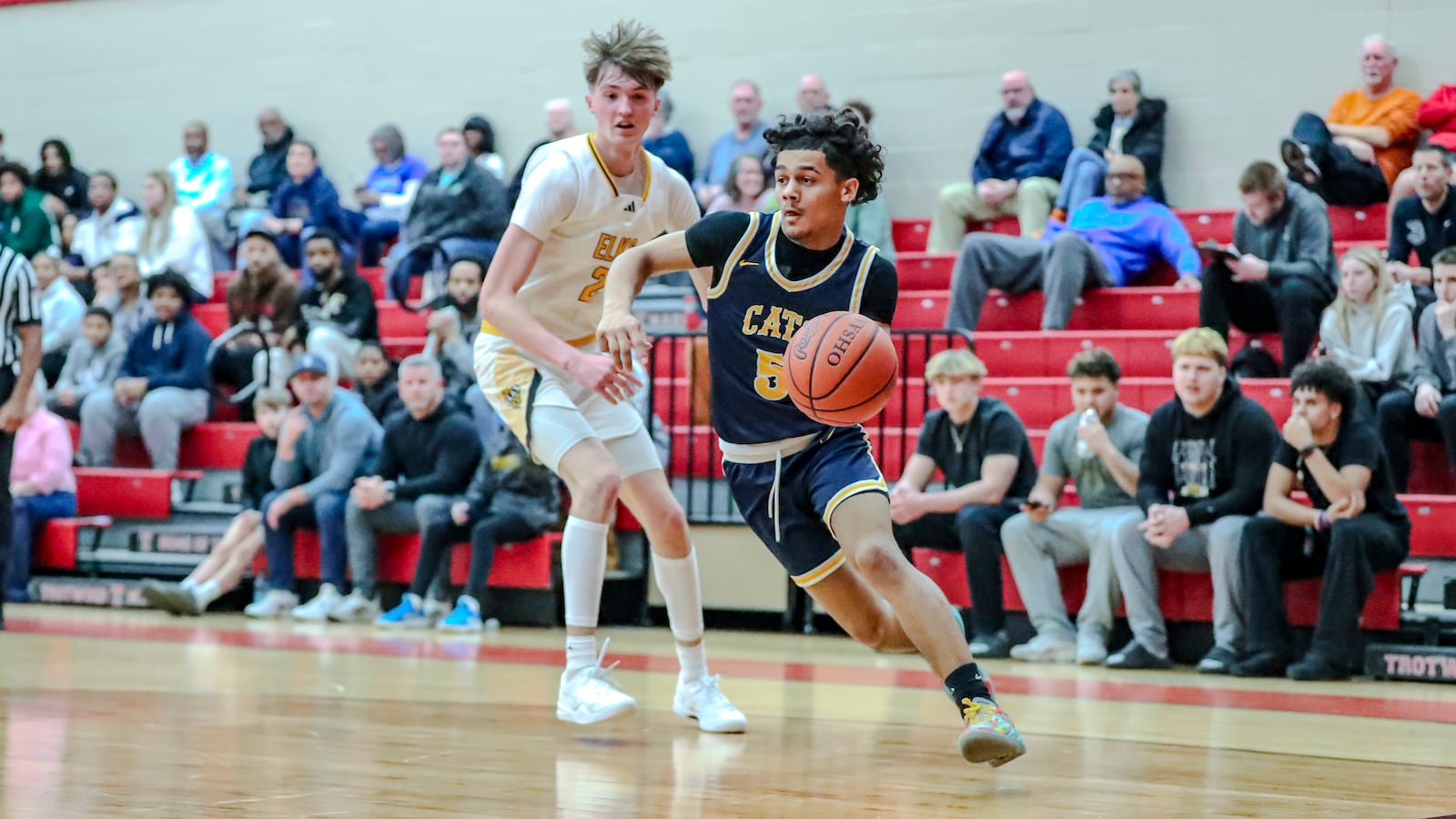 The Centerville High School boys basketball team beat Springfield 63-45 in a Division I district semifinal game on Tuesday, Feb. 26, at Trotwood Madison High School. MICHAEL COOPER/STAFF PHOTO
