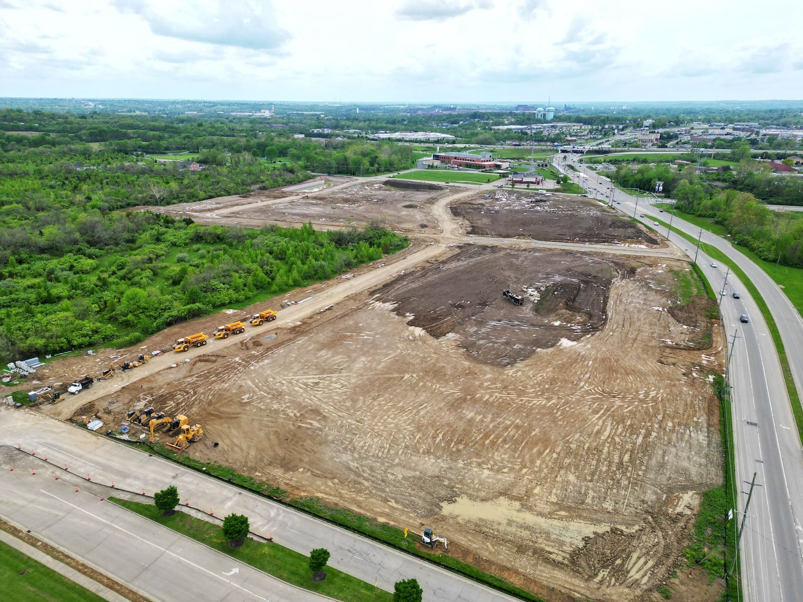 Infrastructure work is near completion for a proposed 160,000-square-foot multipurpose event center along Interstate 75 on the east side of Middletown at Ohio 122 and Union Road, shown by aerial view Friday, May 2, 2025. NICK GRAHAM/STAFF