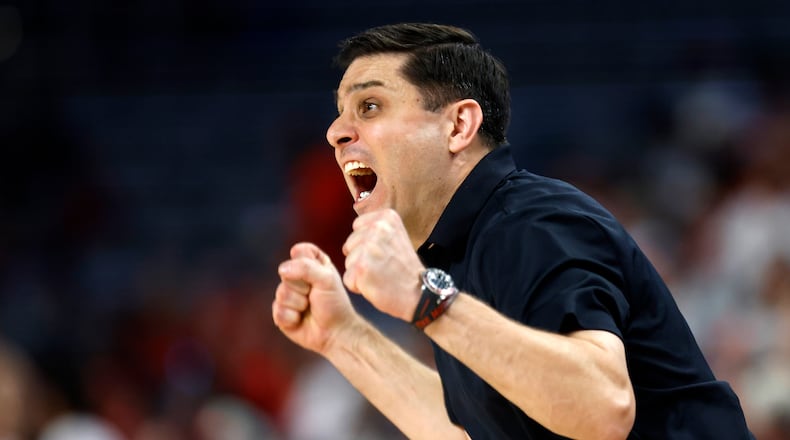 Cincinnati head coach Wes Miller calls a play during the first half of an NCAA college basketball game against Houston in the semifinals of the American Athletic Conference Tournament, Saturday, March 11, 2023, in Fort Worth, Texas. (AP Photo/Ron Jenkins)