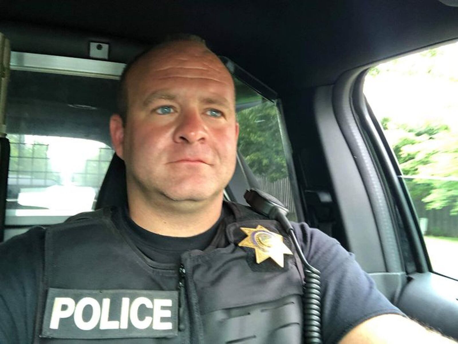 Oxford Twp. Police Sgt. Jeff King is shown on duty in his cruiser but his family hobby drag racing police-themed muscle cars puts him behind the wheel of totally different vehicles, too. CONTRIBUTED