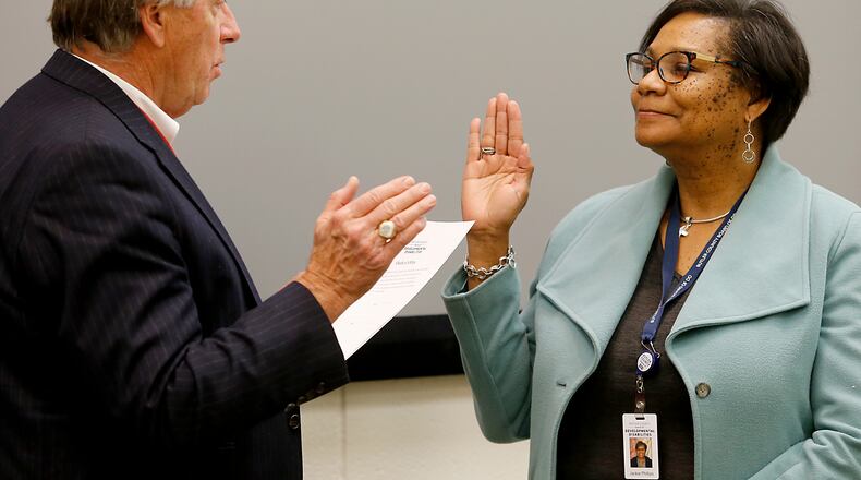 Middletown Heath Commissioner Jackie Phillips is sworn as a board member for the Butler County Board of Developmental Disabilities on Jan. 11 by Butler County Commissioner T.C. Rogers. PROVIDED