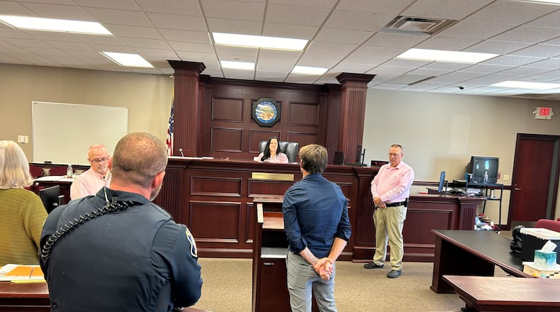 Butler County Area III Judge Courtney Caparella-Kraemer discusses the case of a man who was charged with inducing panic. He graduated Tuesday from a court mental health program after receiving treatments for one year. West Chester police officer Dan Dean, who responded to the original call for a man possibly suicidal, attended the man's graduation. RICK McCRABB/CONTRIBUTOR