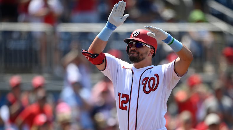 Washington Nationals' Kyle Schwarber celebrates his home run during the fifth inning of a baseball game against the New York Mets, Sunday, June 20, 2021, in Washington. (AP Photo/Nick Wass)