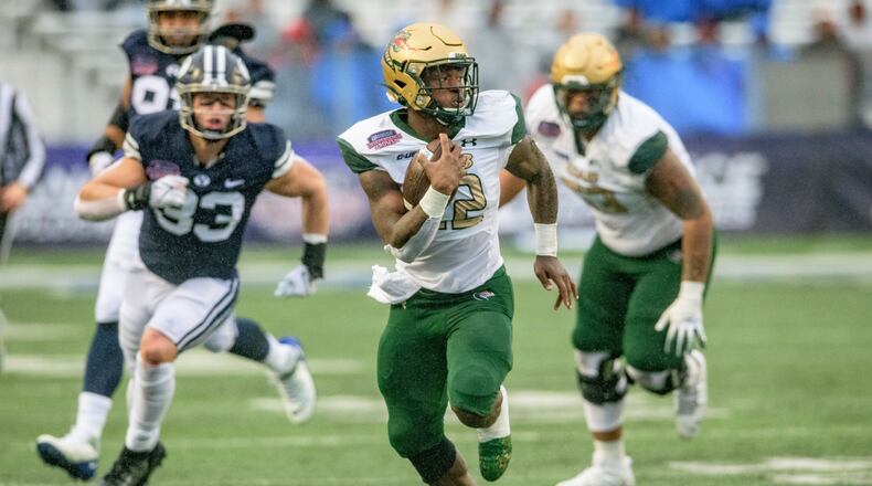 UAB running back DeWayne McBride (22) breaks free for a touchdown run during the first half of the Independence Bowl NCAA college football game against BYU in Shreveport, La., Saturday, Dec. 18, 2021. (AP Photo/Matthew Hinton)