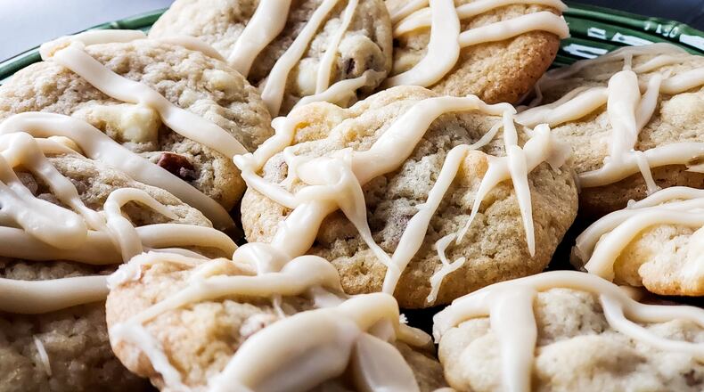 Vermont Maple White Chocolate Chip and Pecan Cookies Drizzled with a Maple Glaze by Gina Allen. NICK GRAHAM/STAFF