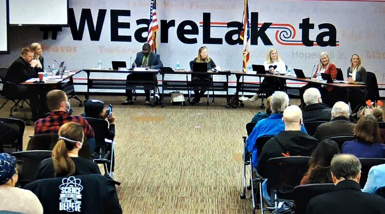 The governing board of the 17,000-student Lakota school system discussed during its Monday meeting whether to change is student mask policies and expand the board's power over reviewing curricula in the wake of some parents' complaints about some classroom lessons pertaining to racial issues. The board took no vote on proposed resolutions. (Photo By Michael D. Clark\Journal-News)
