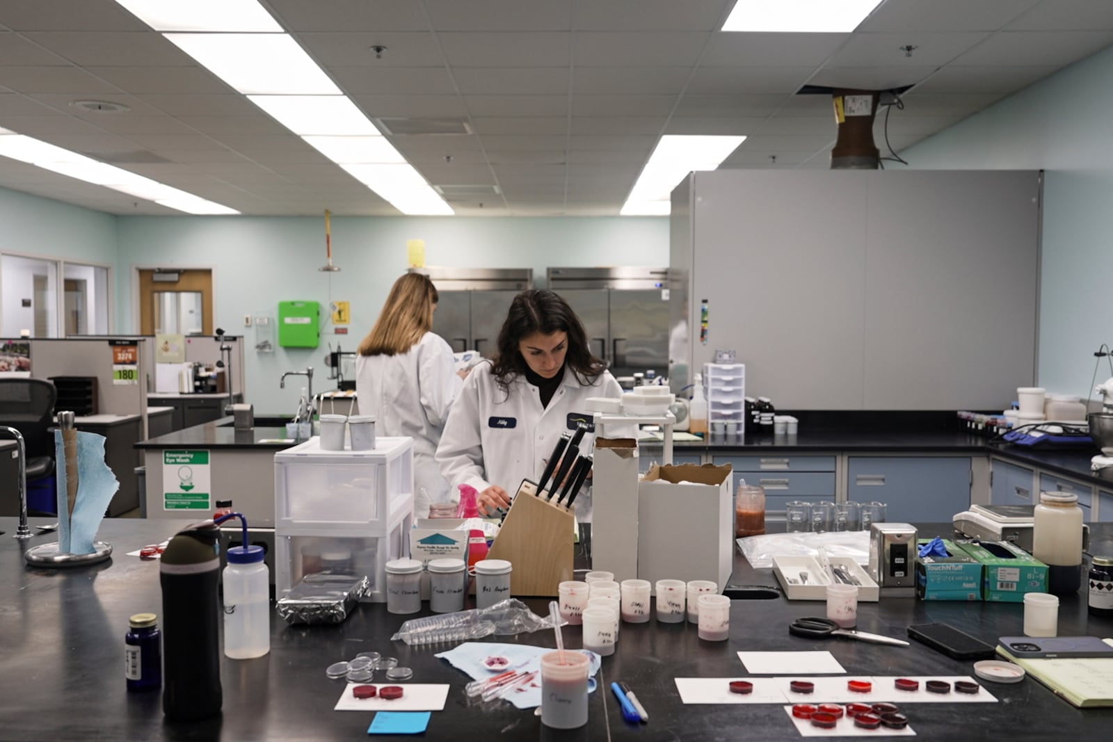 Abby Tampow works in a Sensient Colors laboratory in St. Louis on April 2, 2025. (AP Photo/Mary Conlon)