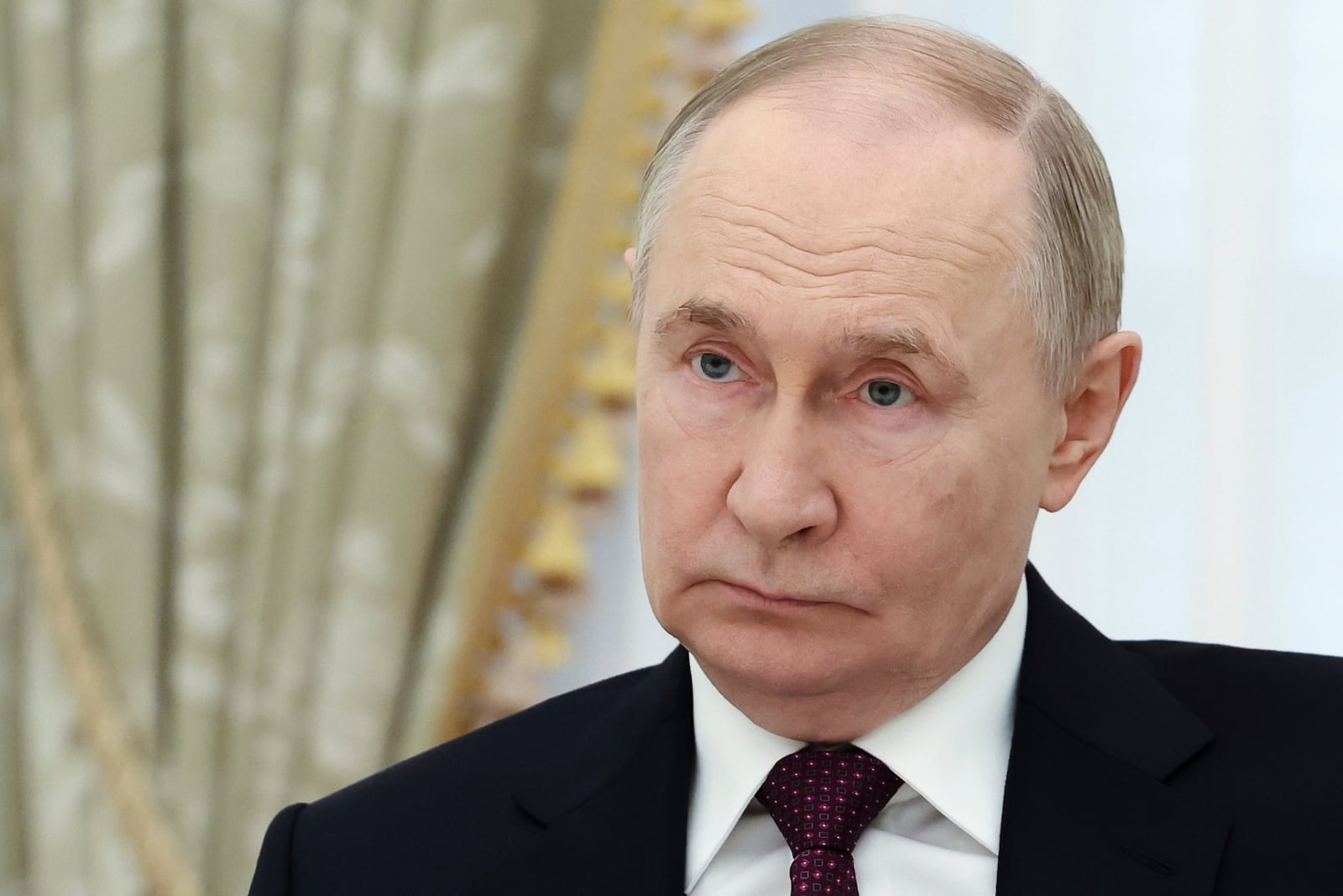 Russian President Vladimir Putin listens to Iranian Foreign Minister Abbas Araghchi during their talks at the Kremlin in Moscow, Russia, Monday, June 23, 2025. (Alexander Kazakov, Sputnik, Kremlin Pool Photo via AP)