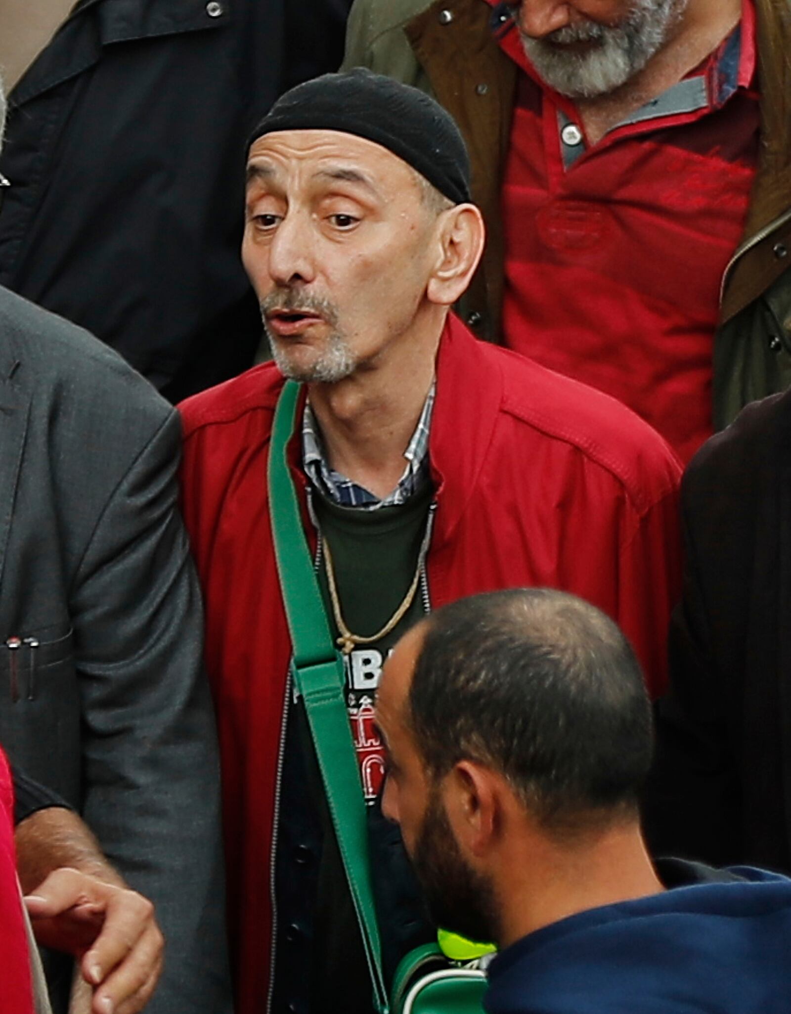Ziad Rahbani, centre, a visionary Lebanese composer, playwright and pianist, during an anti-government protest organized by the country's communist party, in Beirut, Lebanon, Sunday, Dec. 16, 2018. (AP Photo/Hussein Malla)