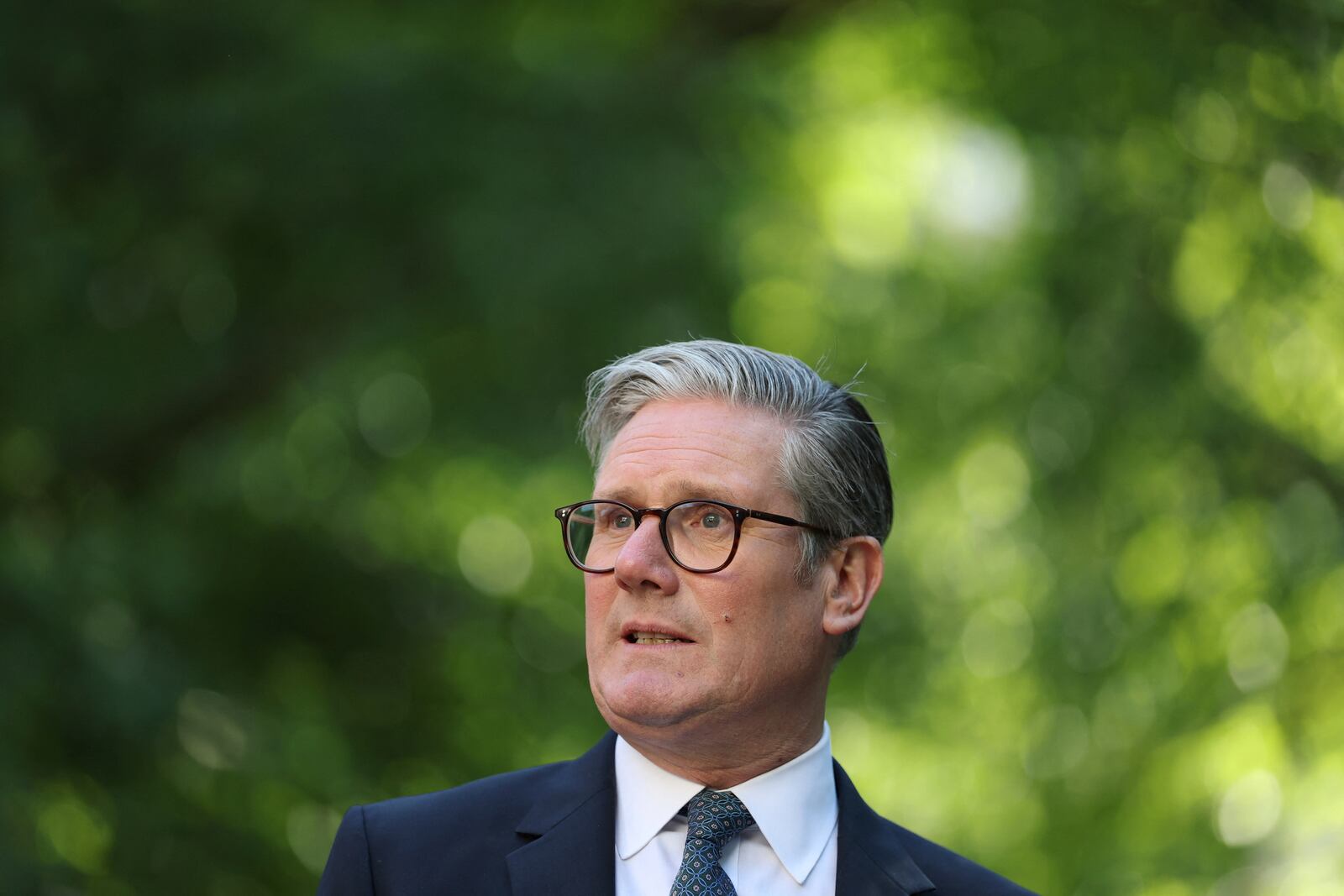 Britain's Prime Minister Keir Starmer speaks during a reception following the UK-EU summit, in London, Monday May 19, 2025. (Hannah McKay/Pool via AP)
