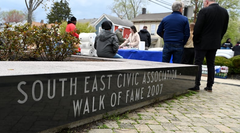 Bailey Square is one of several notable landmarks in the Riverview neighborhood, often called the 2nd Ward. The inaugural Heritage Walk hosted by 17Strong will celebrate Riverview and other areas with a walking tour. Pictured is Barbecuing for a Better Hamilton event held in April at Bailey Square and hosted by the city of Hamilton. MICHAEL D. PITMAN/FILE