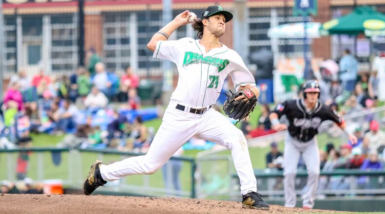 Dayton starter Lyon Richardson motions toward home plate during their game against the Lansing Lugnuts on Thursday night at Fifth Third Field. The Dragons won 7-2. CONTRIBUTED PHOTO BY MICHAEL COOPER