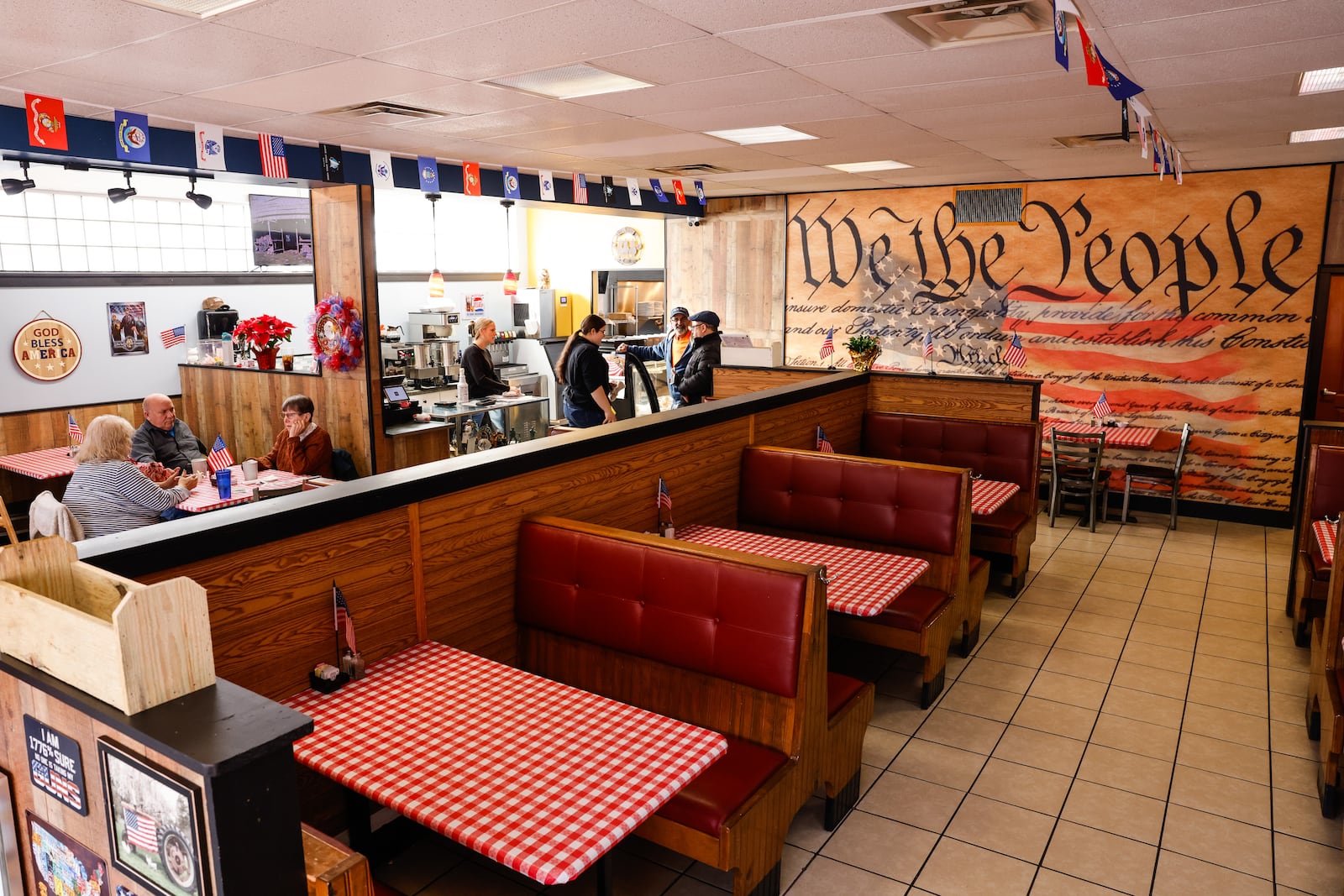 Lynn's Freedom Cafe is open daily on Pleasant Ave. in Hamilton's Lindenwald neighborhood. NICK GRAHAM/STAFF