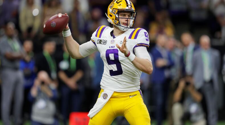 LSU quarterback Joe Burrow passes against Clemson during the second half of a NCAA College Football Playoff national championship game Monday, Jan. 13, 2020, in New Orleans. (AP Photo/Gerald Herbert)