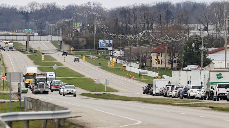 Monroe continues looking for ways to make intersections on Ohio 63 safer. The city plans to add stripping and backplates to signal heads this year.  NICK GRAHAM/STAFF