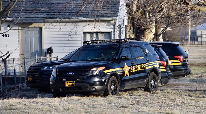 Butler County cruisers parked at a New Miami residence this morning were taking part in training. NICK GRAHAM/STAFF