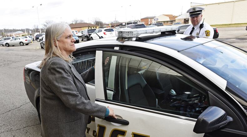 Local mental health experts like Kathy Becker (left) have been training police officers in various departments since 1993, but there has not been a comprehensive, countywide training course. The local chapter of the National Alliance on Mental Illness has marshalled a group of police, mental health experts and others in an effort to bring Crisis Intervention Team (CIT) training to Butler County. NICK GRAHAM/2015
