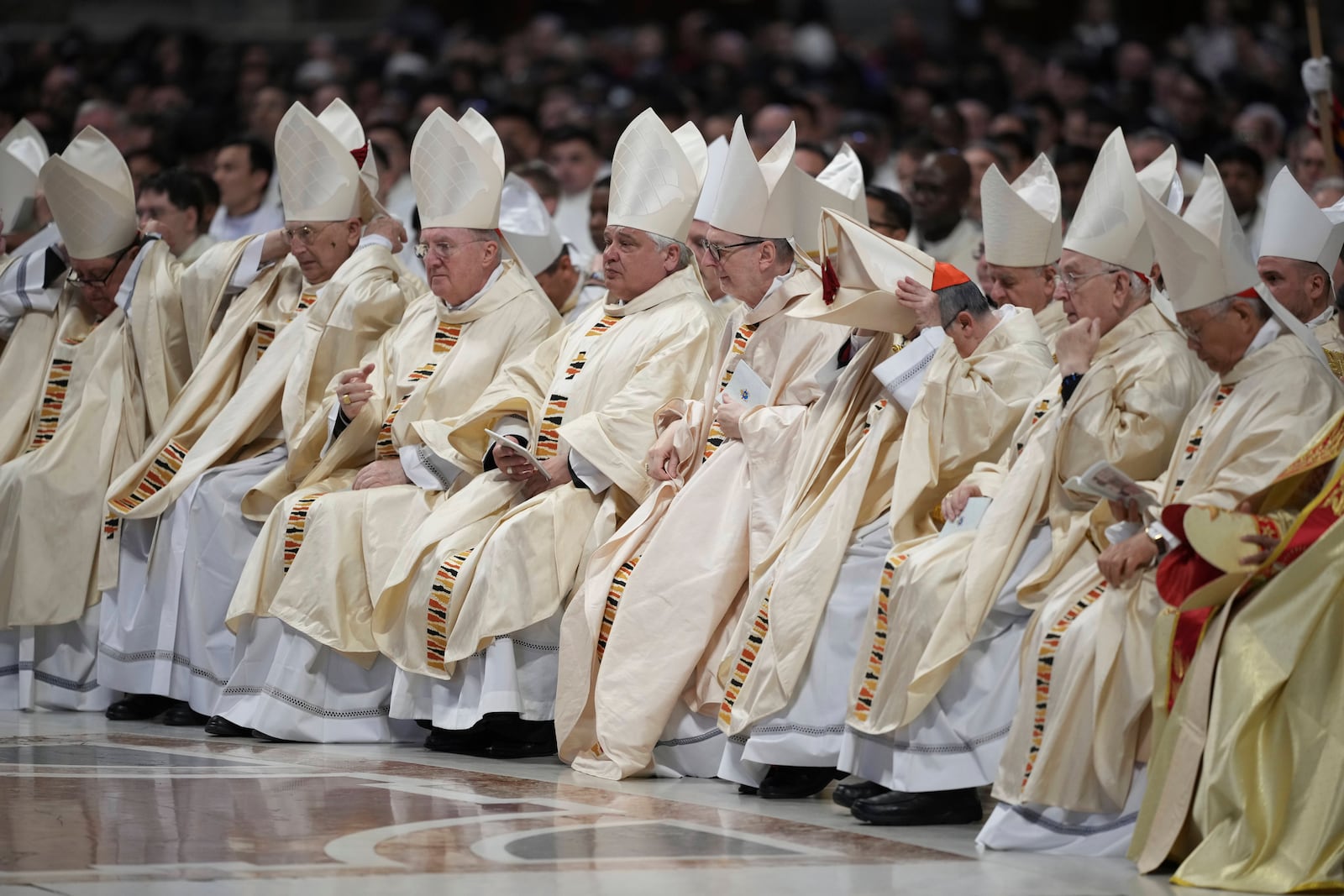 Cardinals attend the Chrism Mass on Ash presided by Delegate of the Holy Father, Cardinal Domenico Calcagno at the St. Peter's Basilica at The Vatican, Thursday, April. 17, 2022. (AP Photo/Andrew Medichini)