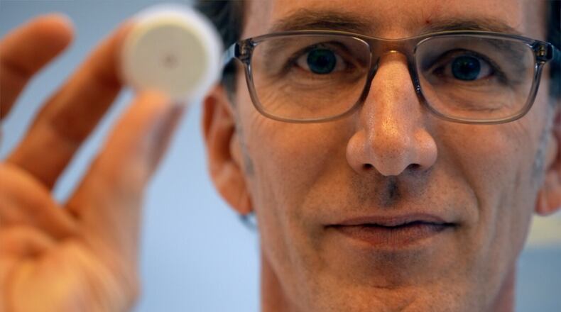 Jason Heikenfeld, a professor of biomedical engineering at the University of Cincinnati, is developing a device to study heart disease in the same way we can monitor diabetes, without a trip to the doctor. KEITH BIERYGOLICK/WCPO