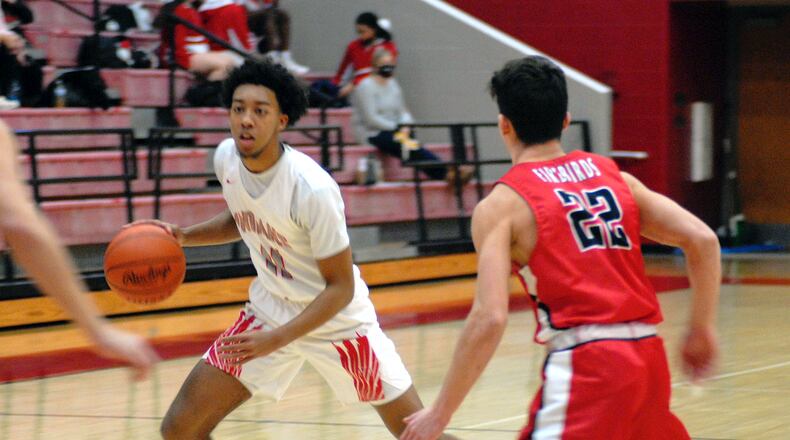 Logan Woods (with ball) leads GMC-leading Fairfield in scoring after playin ghis first two seasons at Cincinnati Christian School. Chris Vogt/Butler County High School Sports Report
