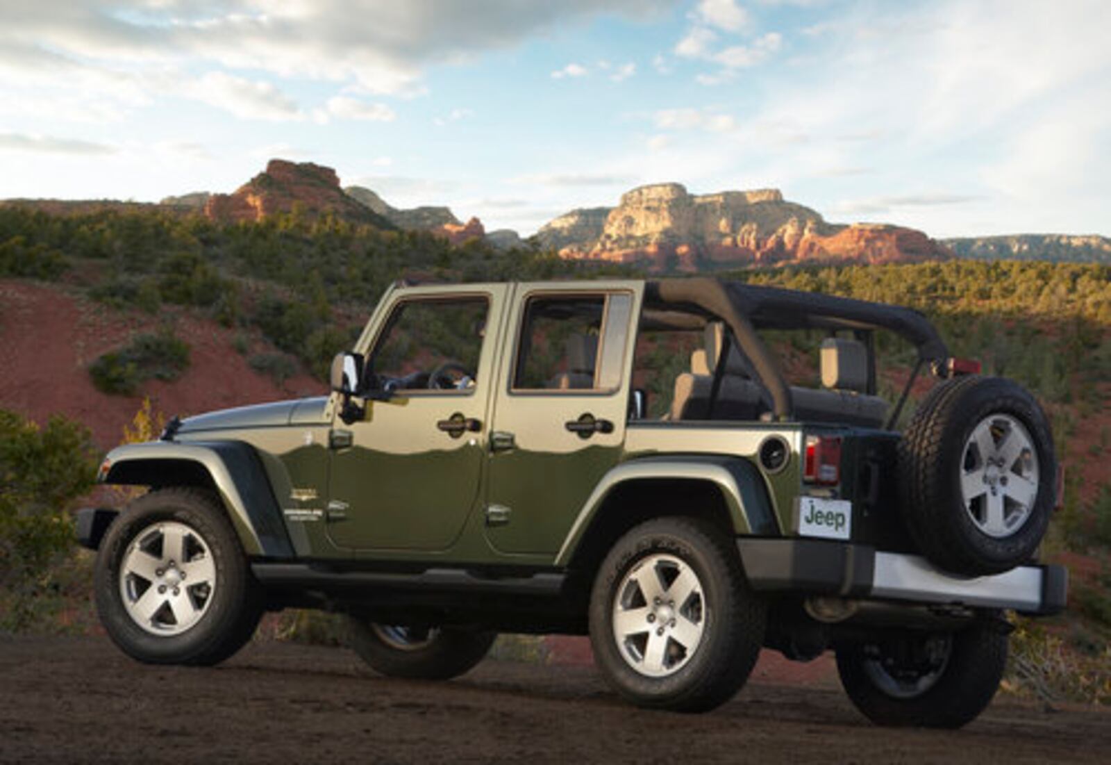 The Jeep Wrangler Unlimited is offered in rear-wheel and 4-wheel drive. All Wrangler Unlimited models use the same body-on-frame construction, full frame or half doors, exposed hinges, fold-down windshield and removable convertible tops.