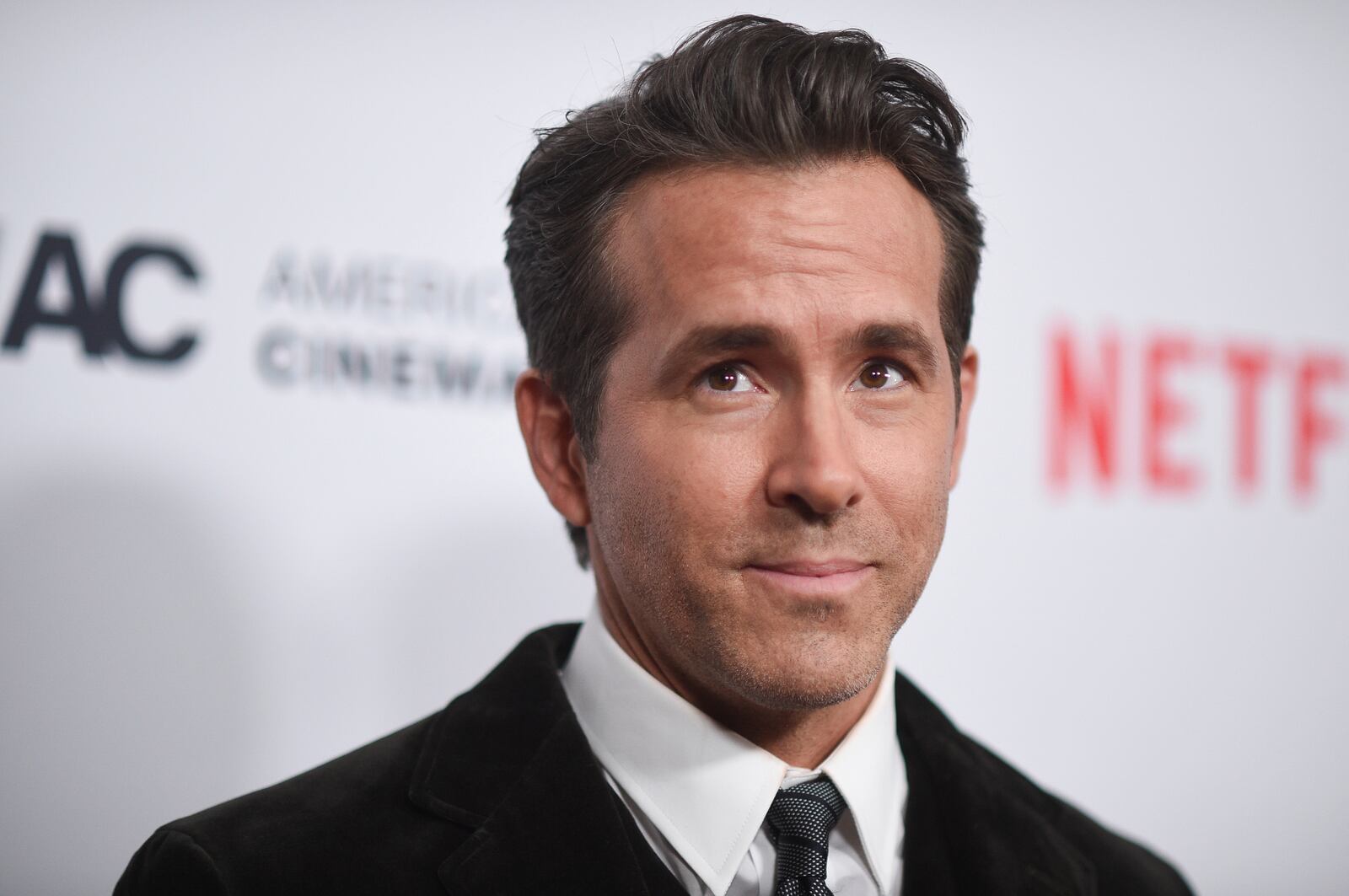 FILE - Ryan Reynolds arrives at the 36th annual American Cinematheque Awards, Nov. 17, 2022, at the Beverly Hilton Hotel in Beverly Hills, Calif. (Photo by Richard Shotwell/Invision/AP, File)
