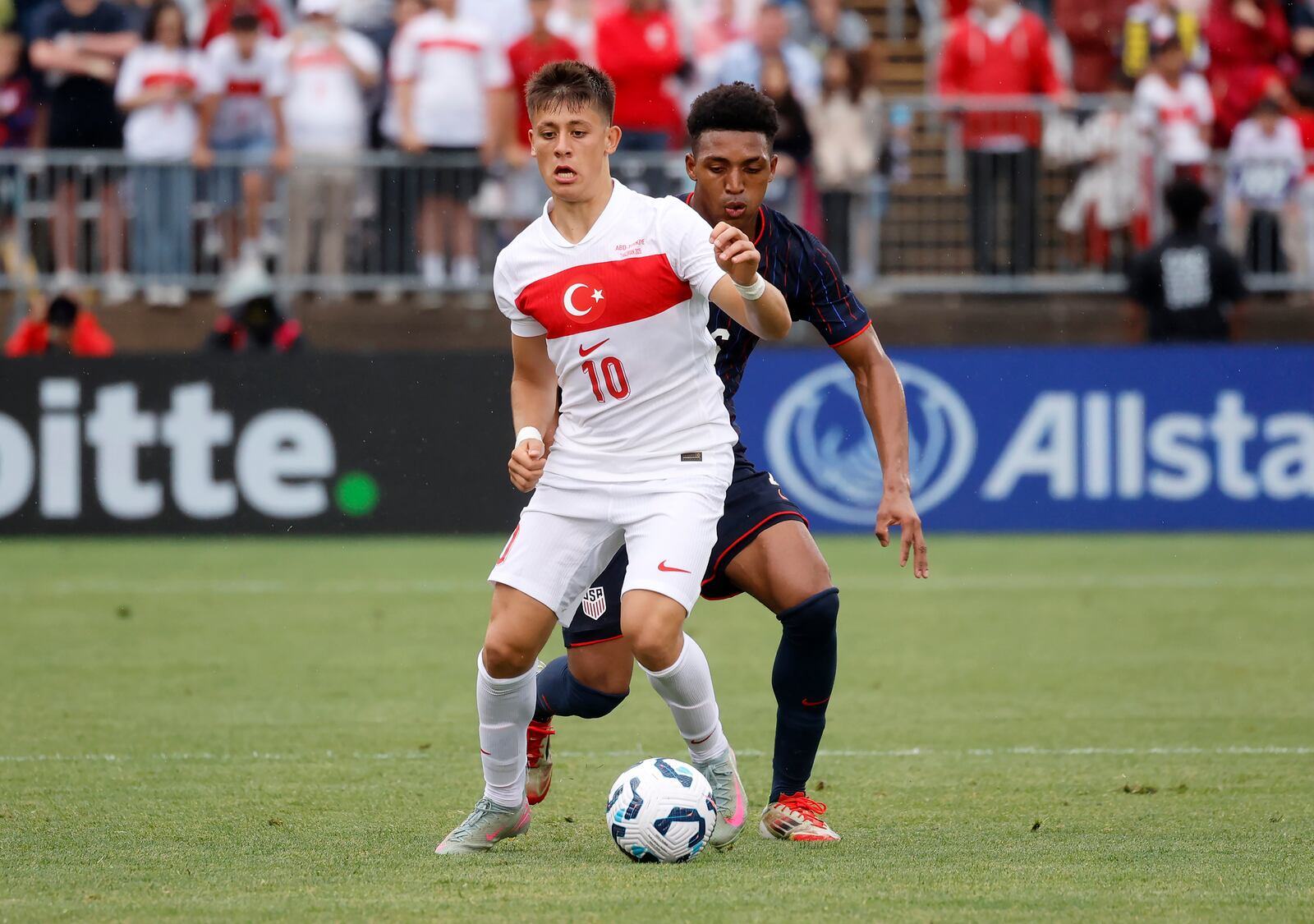 Turkey forward Arda Güler (10) controls the ball ahead of United States defender Alex Freeman (16) during the second half of an international friendly soccer game, Saturday, June 7, 2025, in East Hartford, Conn. (AP Photo/Mary Schwalm)