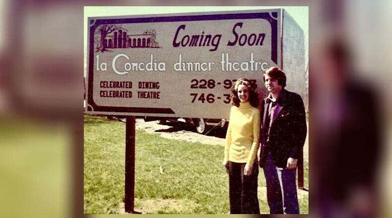 Joe and Marilyn Mitchell preview La Comedia Dinner Theatre's 1975 arrival. Marilyn designed and painted the sign. PHOTO COURTESY OF TERRY STUMP