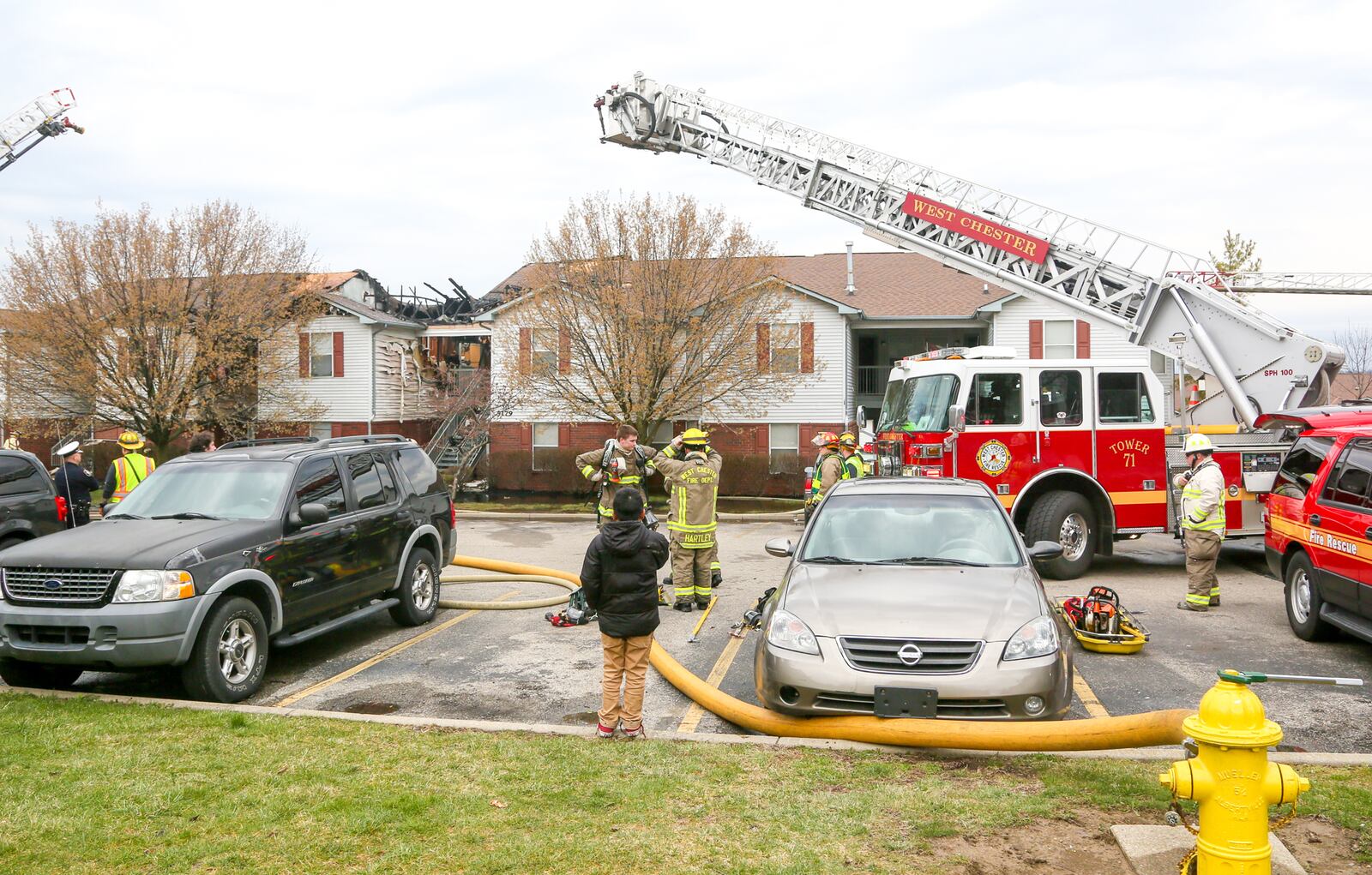 West Chester Twp. fire department responded with mutual aid to a fire at the Meadow Ridge apartment complex, near Muhlhauser Road in West Chester, Monday, Mar. 20, 2017. Three people suffered smoke inhalation and up to 10 families will be displaced due to the fire. GREG LYNCH / STAFF