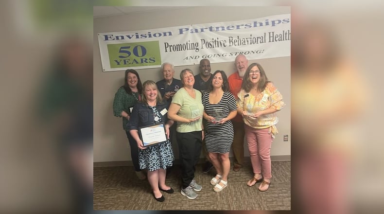 The Envision Partnerships’ Butler County Suicide Prevention Coalition held its first Inaugural Member Appreciation Celebration May 9. Pictured are, from left, front row: Michelle Morand (Midpointe Library System), Jessie Schoff (Cincinnati Children’s Medical Center), Carissa Piper (Beckett Springs), Kristen Smith (Envision Partnerships). Back row: Kelly Eversole (Community First Solutions), Mark Applegate (Commissioner for BC Veterans Service Commission), Pastor Trevor Phillips (Saving Grace Community Church), James Woods (Life Side Ohio). CONTRIBUTED