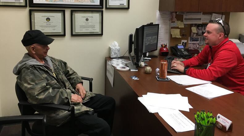 Butler County Veterans Service Commission Service Officer Casey Elliot James works with veteran Robert Roberson to navigate the veterans benefits system.
