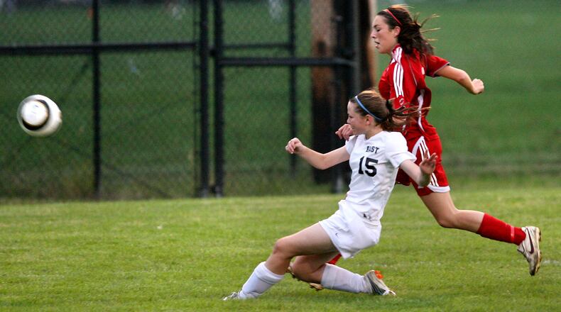 Lakota East’s Rianna Reese (15) clears the ball away from Fairfield’s Lauren Hoover during a game Sept. 20, 2011, at Hopewell Soccer Stadium. JOURNAL-NEWS FILE PHOTO