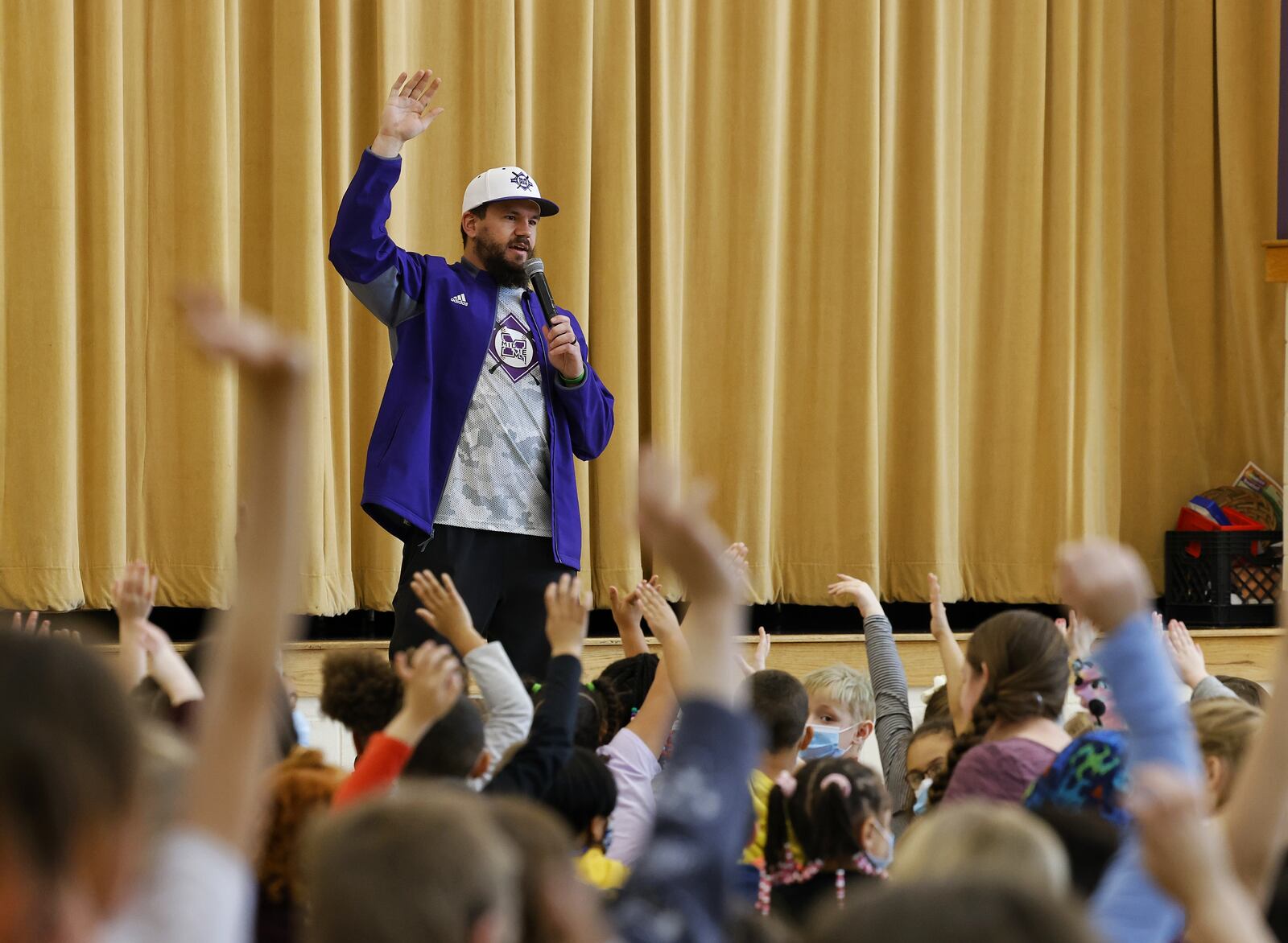 Major League Baseball player Kyle Schwarber speaks to students at Wildwood Elementary School about character and the Middie Way baseball program Tuesday, Feb. 14, 2022 in Middletown. NICK GRAHAM/STAFF