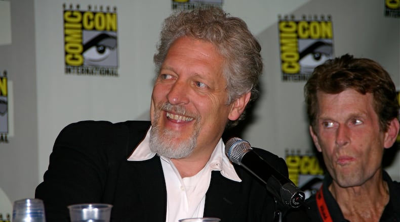 Urbana native Clancy Brown (left) addresses the fans with fellow voice-actor Kevin Conroy (the voice of the animated Batman) at Comic-Con International in San Diego in 2009. Brown voiced the Marvel villain Surter in Thor: Ragnarok. FILE PHOTO