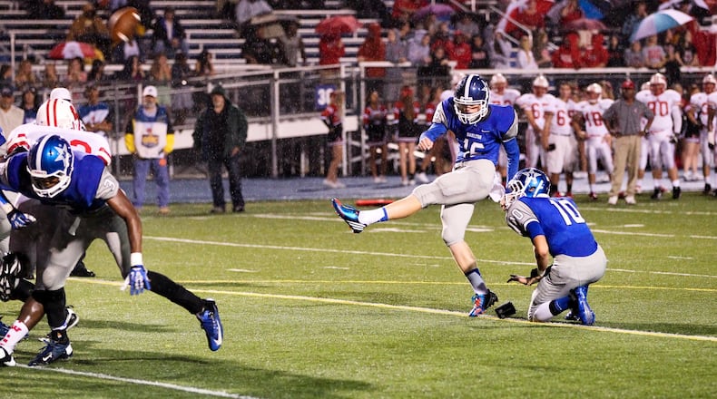 Hamilton’s Jarod Morrison (16) kicks an extra point during a game against Lakota West at Virgil Schwarm Stadium in Hamilton on Sept. 20, 2013. JOURNAL-NEWS FILE PHOTO