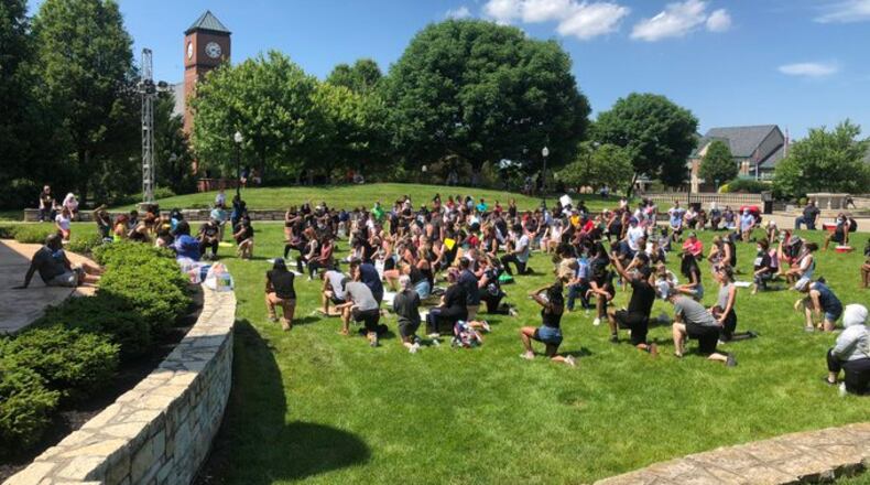 A crowd gathered at Village Green in Fairfield after a march in protest on Saturday, June 6, 2020. RICK McCRABB / STAFF