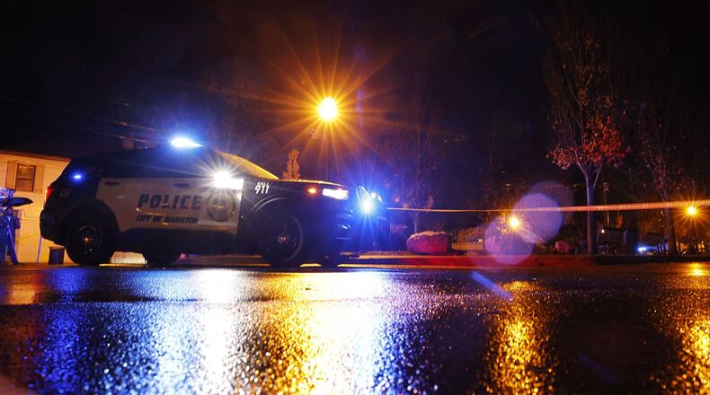 Hamilton Police are seen at a shooting investigation Oct. 25, 2022. The HPD will receive funds to purchase new technology to assist in preventing and investigating violent crime, to increase patrols and investigations in hot-spot areas and to offer hiring bonuses for new officers. NICK GRAHAM/FILE