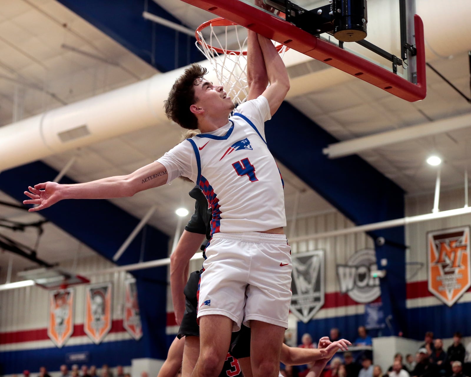 Tri-Village junior Griffin Richards shoots the ball during their game against Preble Shawnee on Friday, Feb. 13, 2026, in New Madison. The Patriots won 55-20. STEVEN WRIGHT / STAFF