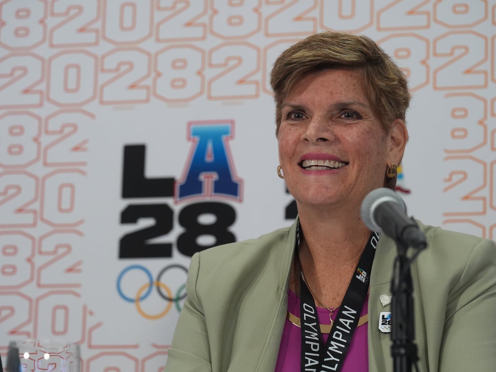 Nicole Hoevertsz, a former Olympian from Aruba who competed in synchronized swimming at the 1984 Los Angeles Olympic Games, now the IOC vice president and LA28 Coordination Commission chair, remembers her past experience competing in Los Angeles during a news conference in Los Angeles, Thursday, June 5, 2025. (AP Photo/Damian Dovarganes)