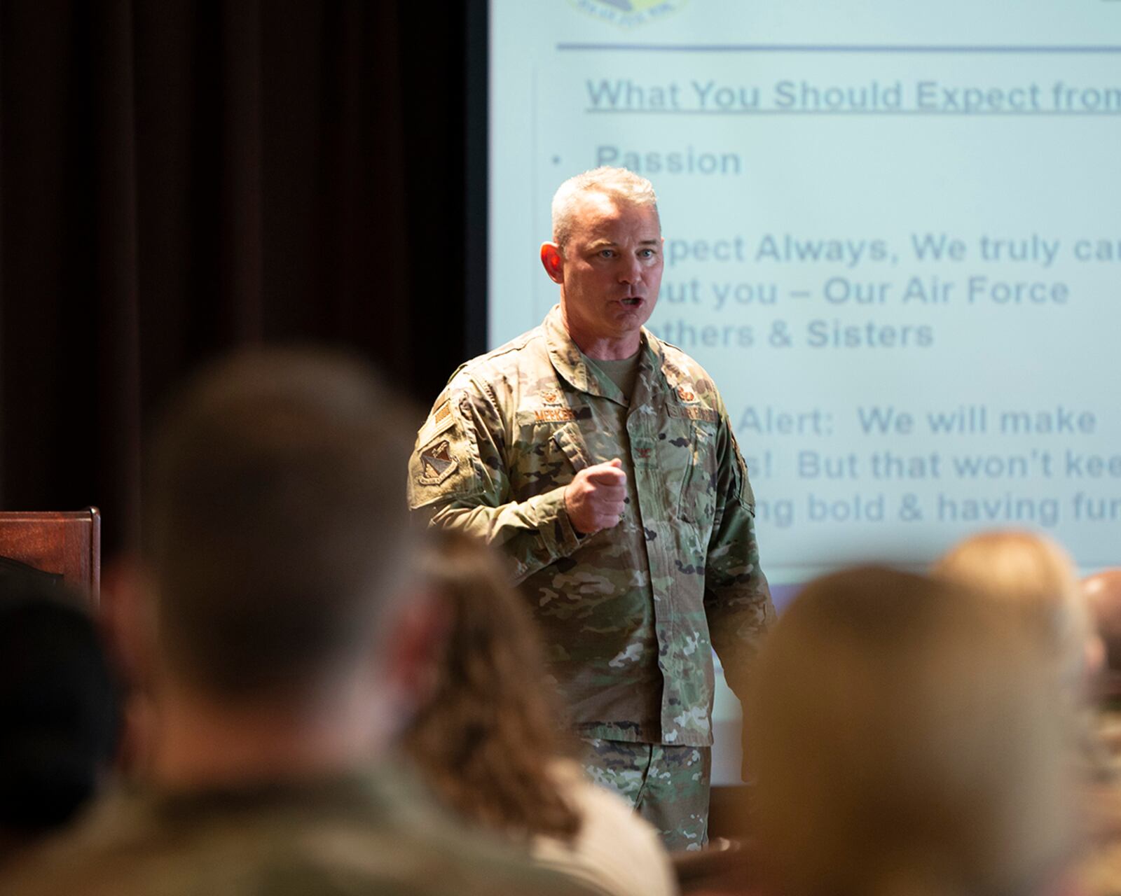 Col. Christopher Meeker, 88th Air Base Wing and installation commander, introduced himself during his first commander’s call Aug. 5, 2022 at Wright-Patterson Air Force Base. U.S. AIR FORCE PHOTO/JAIMA FOGG