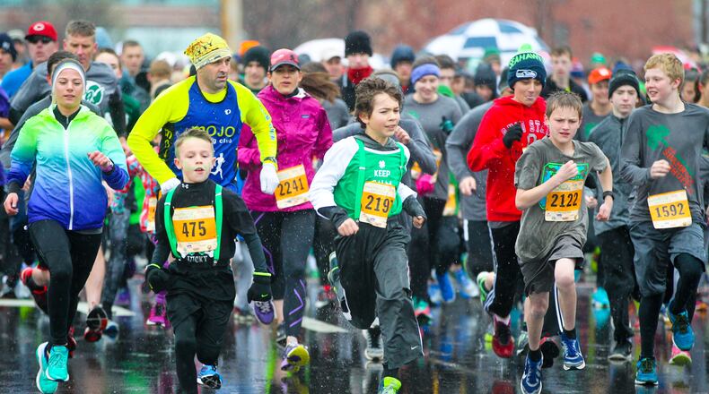 More than 5,000 runners and walkers are expected to participate in the Shamrock Shuffle on Saturday, March 18, in West Chester Twp. The 5K run/walk and 10K run courses wind through the Union Centre area and the Beckett Ridge neighborhood, resulting in several road closures. STAFF FILE/2016