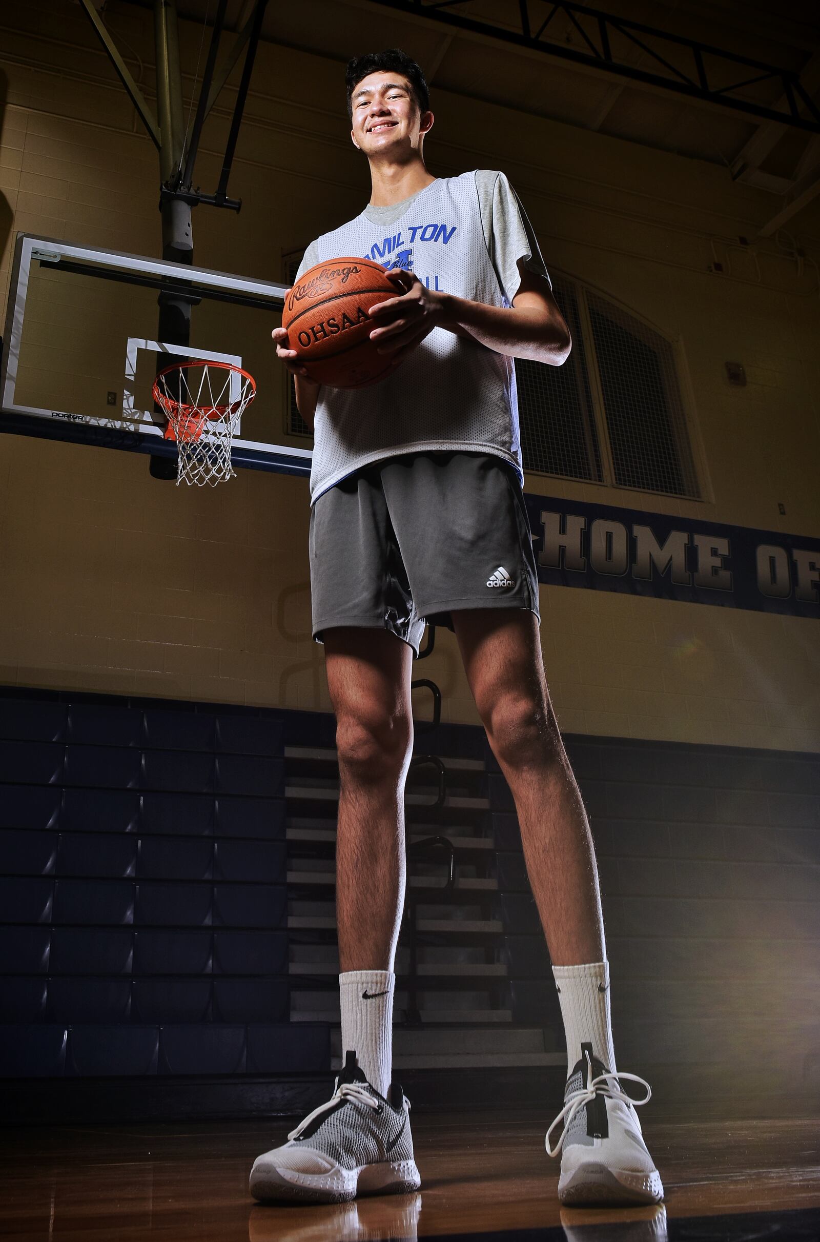 Sage Tolentino, a 210-pound, 7-foot junior from Hawaii is playing basketball for Hamilton High School this season. Tolentino ended up in Hamilton after sports in Hawaii were cancelled due to the coronavirus. He has verbally committed to play college basketball for Bruce Pearl at Auburn University. NICK GRAHAM / STAFF