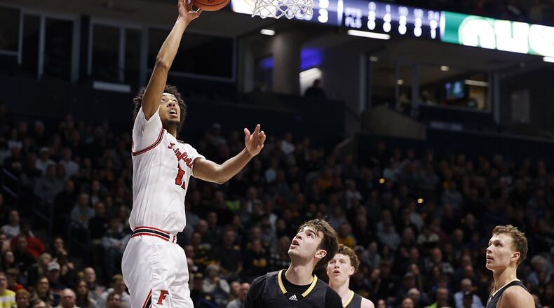 Fairfield's Logan Woods puts up a shot during their Division I regional basketball final against Centerville Saturday, March 12, 2022 at Xavier University's Cintas Center in Cincinnati. Centerville won 55-39. NICK GRAHAM/STAFF