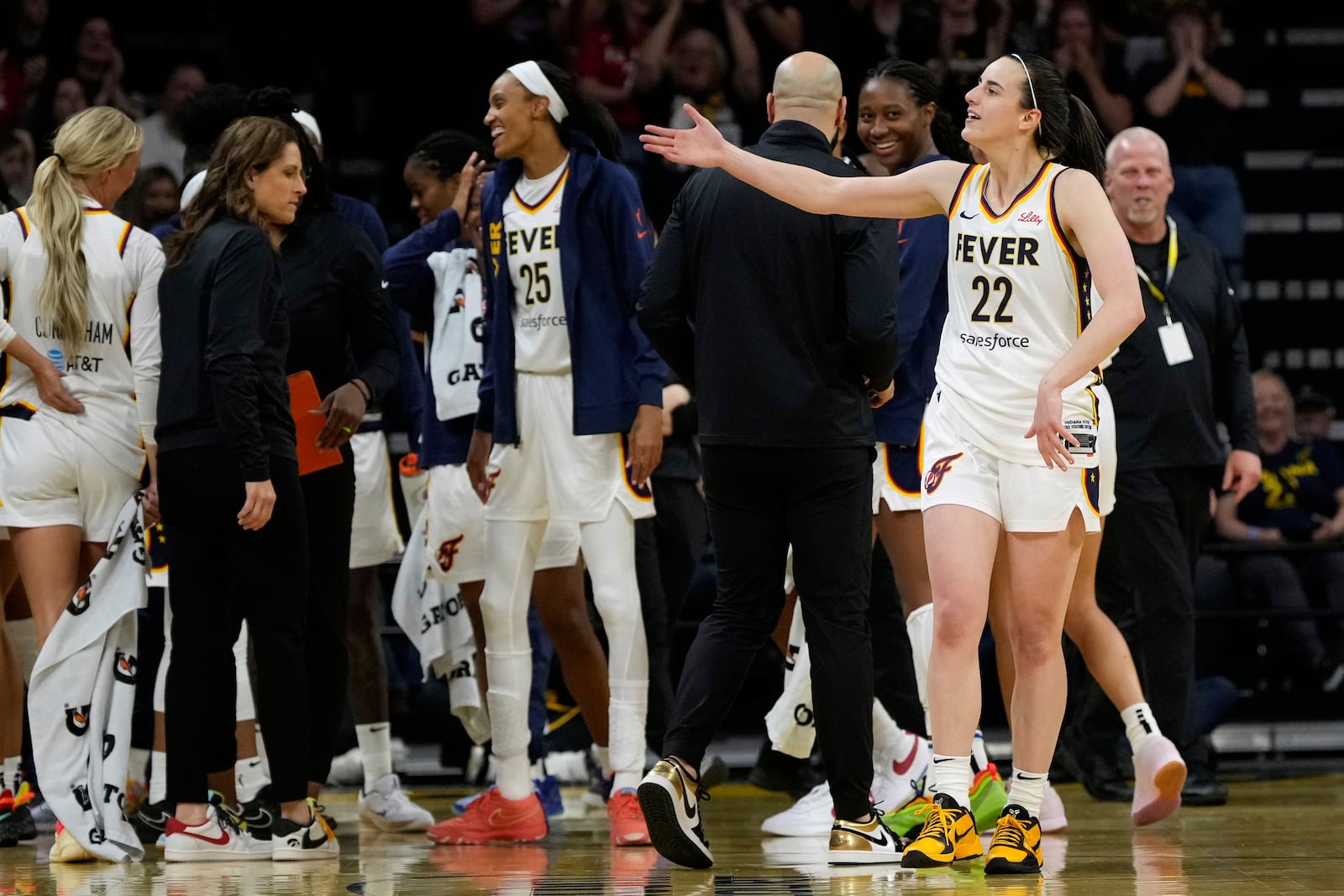 Indiana Fever guard Caitlin Clark reacts to fans after making a three-point basket during the second half of an exhibition women's basketball game against Brazil, Sunday, May 4, 2025, in Iowa City, Iowa. (AP Photo/Charlie Neibergall)