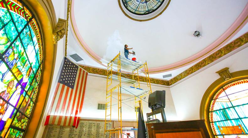 Dave Sackenheim of GDS general contracting services works on the plaster inside dome ceiling of the Soldiers, Sailors and Pioneers Monument in downtown Hamilton, Monday, June 26, 2017. GREG LYNCH / STAFF