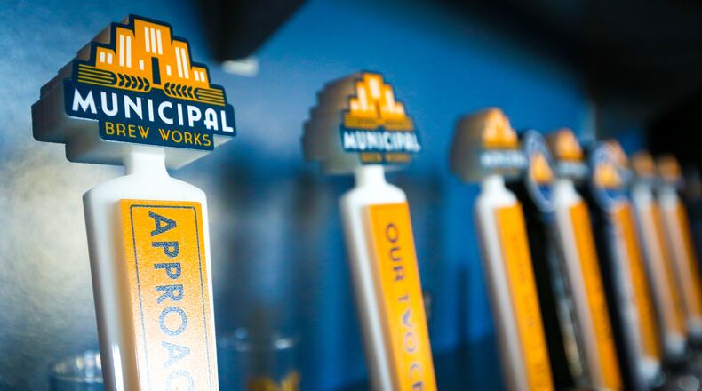 Pictured are several taps at Hamilton's Municipal Brew Works., including one for Approachable Blonde, which won a gold medal for best English Summer Ale at the 2023 U.S. Open Beer Championships. More than 9,000 beers in nearly 150 categories were tasted, judged, and the top three in each category were awarded medals. GREG LYNCH/FILE