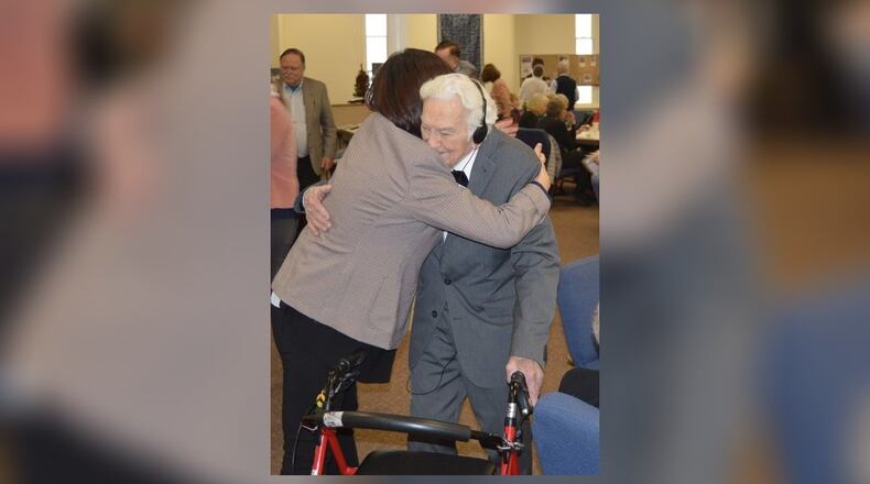 Hugs and best wishes abounded Jan. 6, 2019 at a celebration of the 100th birthday of John Blocher held in the Community Room of the Oxford United Methodist Church. CONTRIBUTED/BOB RATTERMAN