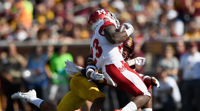 MINNEAPOLIS, MN - SEPTEMBER 15: Antonio Shenault #34 of the Minnesota Golden Gophers tackles Davion Johnson #23 of the Miami RedHawks during the second quarter of the game on September 15, 2018 at TCF Bank Stadium in Minneapolis, Minnesota. The Golden Gophers defeated the Redhawks 26-3. (Photo by Hannah Foslien/Getty Images)