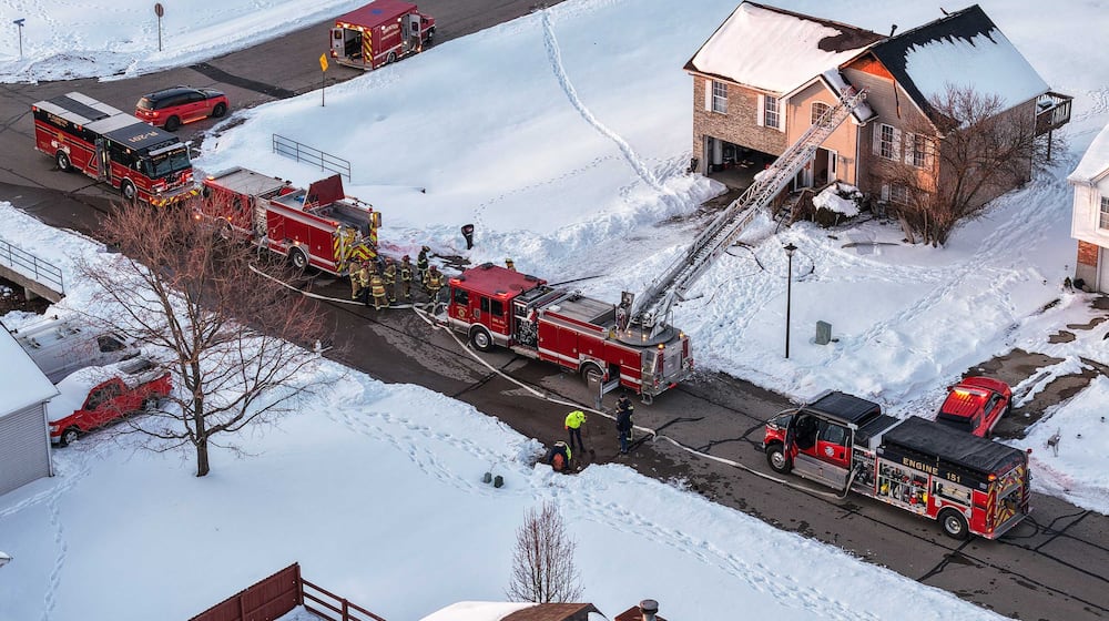 Emergency crews fight a fire in a house in the 700 block of W. Aberdeen Drive in Trenton on Feb. 4, 2026. NICK GRAHAM, STAFF