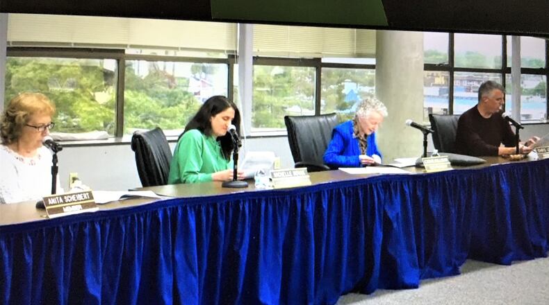 Middletown Schools recently passed a one-year anniversary for using the TV production crew from nearby Hamilton to handle the online broadcasts of its school board meetings. Middletown school officials tout the agreement as providing vastly superior online broadcast images and audio. Pictured is an image captured from a recent Middletown school board broadcast. (Photo By Michael D. Clark\Journal-News)